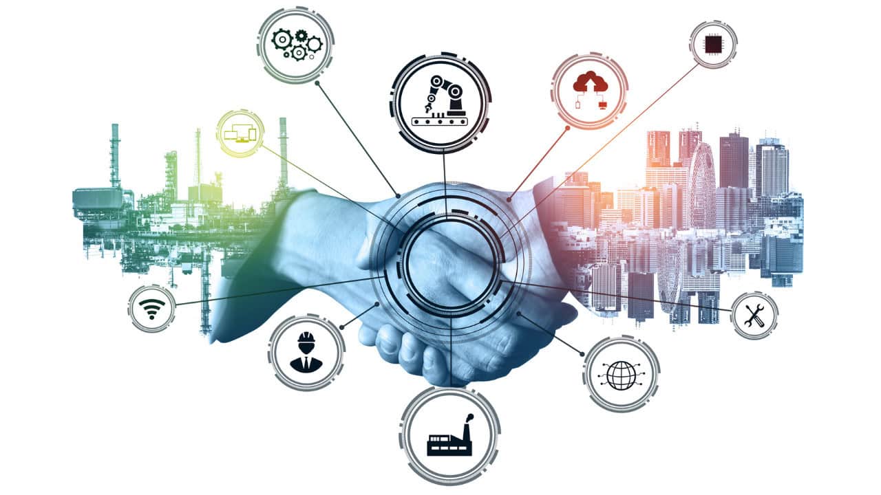 Two hands shaking, superimposed over a cityscape and industrial infrastructure. Around the hands, there are various technology-related icons connected by lines, representing elements such as robotics, cloud computing, industrial machinery, networking, and data analysis. The image emphasizes themes of industrial innovation and L&D.